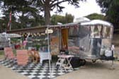 Photo of Large 1947 Spartan Manor Travel Trailer, Side Awning and Party Decorations
